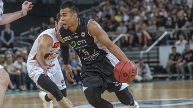 Hard to guard: Melbourne United import Stephen Holt drives into the paint against the Illawarra Hawks at Hisense Arena.