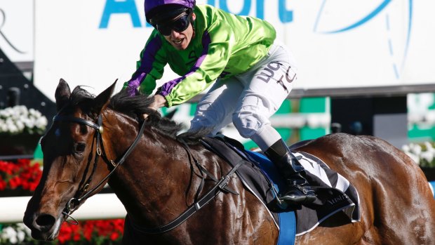 Jockey Tim Clark rides Global Glamour to win the Sydney Airport Flight Stakes. 