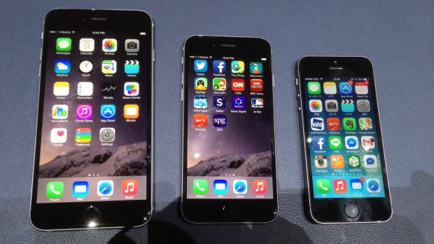 The Apple iPhone 6 Plus and 6, next to the iPhone 5S.