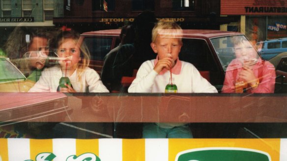 Eamon Donnelly (right), author of The Milk Bars Book, at a Geelong milk bar in the 1980s.