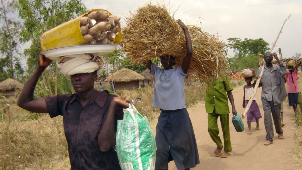 Villagers in northern Uganda flee following new attacks by the Lord's Resistance Army in 2006.