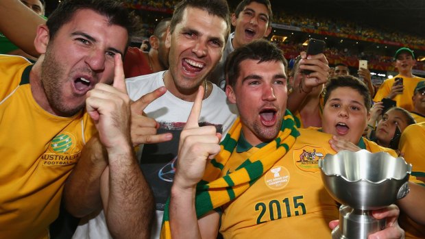 Euphoria: Mat Ryan celebrates with fans at Stadium Australia after the defeat of South Korea.