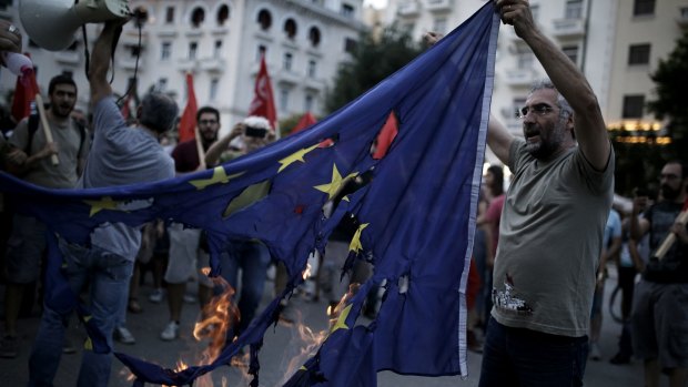 Protesters vented their anger at austerity measures on a European Union (EU) flag at a demonstration in Thessaloniki, Greece, on Sunday.