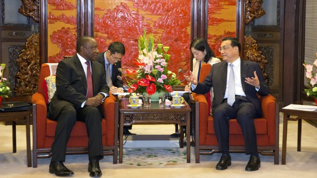 South Africa's deputy president Mr Ramaphosa, with Chinese premier  Mr Li in Beijing on Tuesday. 