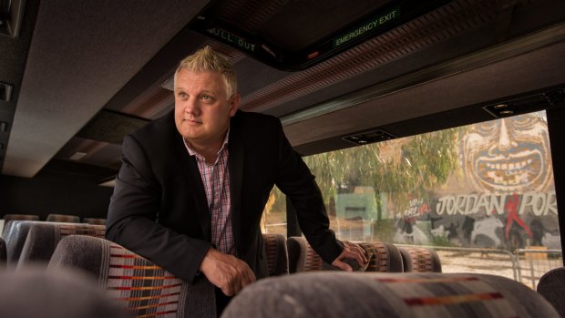 Simon Rowe inspects a coach he plans to convert into a free Sleep Bus for the homeless this winter.