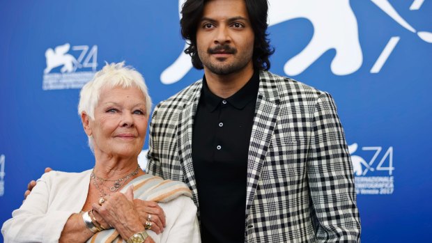 Judi Dench, left, and Ali Fazal pose during a photo call for the film Victoria And Abdul at the 74th Venice Film Festival in Venice, Italy.