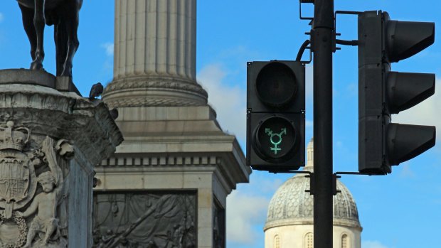 A gender neutral pedestrian light at Trafalgar Square, London. 