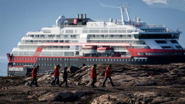 As Greenland's ice melts, MS Roald Amundsen, the world's first hybrid cruise ship, launches.