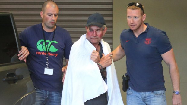 Gino Stocco is taken into Dubbo police station in October 2015.