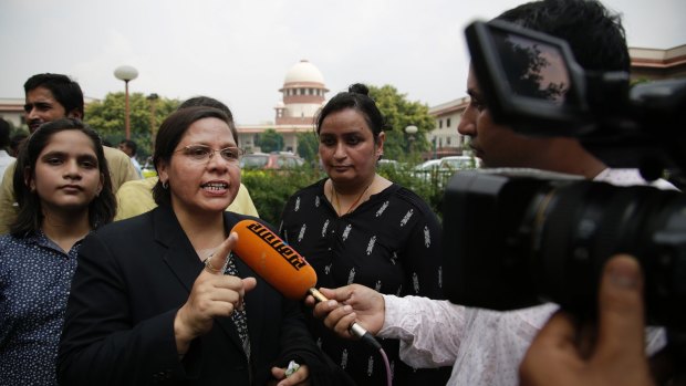 Farha Faiz, a Supreme Court lawyer, speaks to media after the verdict was delivered.