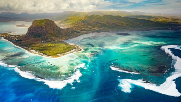 The amazing "underwater waterfall" effect can be seen from the air looking back towards Le Morne.
