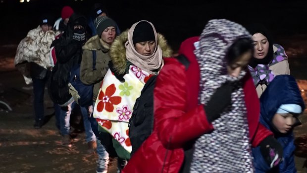 Migrants have been braving sub-zero temperatures as they attempt to cross the border from Macedonia into Serbia. 