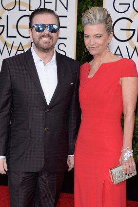 Ricky Gervais arrives with his partner Jane Fallon at the Golden Globes. 