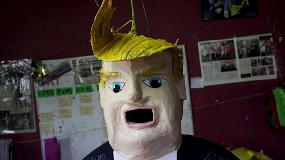 A pinata depicting US Republican presidential candidate Donald Trump hangs outside a workshop in Reynosa, Mexico.