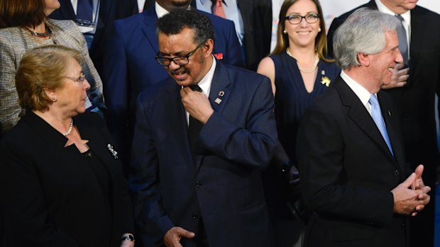 WHO President Tedros Adhanom centre, speaks with Chilean President Michelle Bachelet, left, in Montevideo, Uruguay last week. 