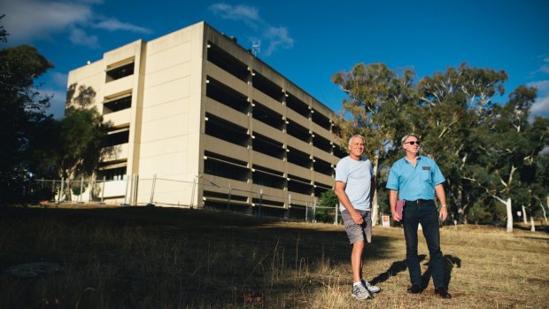 Graham Crompton and Shane West, at the former CSIRO headquarters at Mount Ainslie. The pair are campaigning for the buildings to be saved from a planned quick demolition.