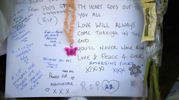 Tributes left in central Manchester on Tuesday.