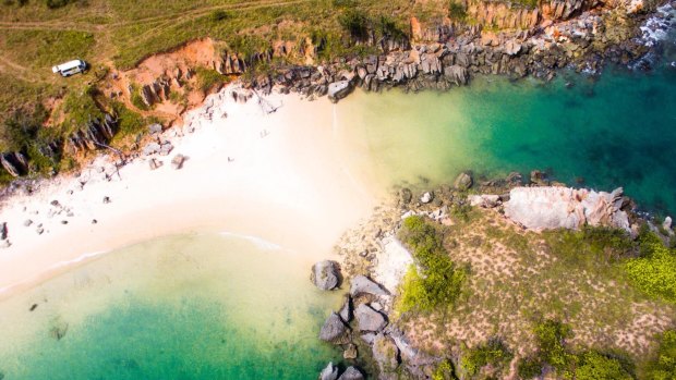 Located 90 minutes drive out of Nhulunbuy, where two perfect beaches meet at a rocky island, Lonely Beach is dead-set from a film set.