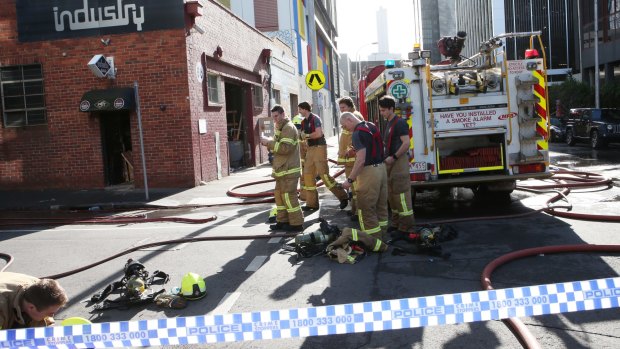Police and firefighters at a business in Southbank.