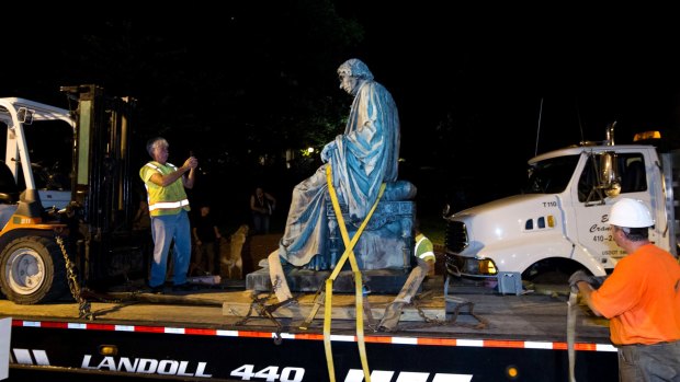 A monument dedicated to US Supreme Court Chief Justice Roger Brooke Taney is removed from outside the Maryland State House in Annapolis on Friday morning.
