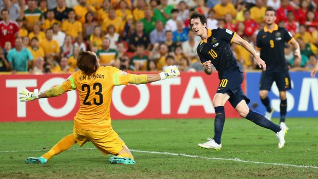 Robbie Kruse has a shot at goal during the game against South Korea.