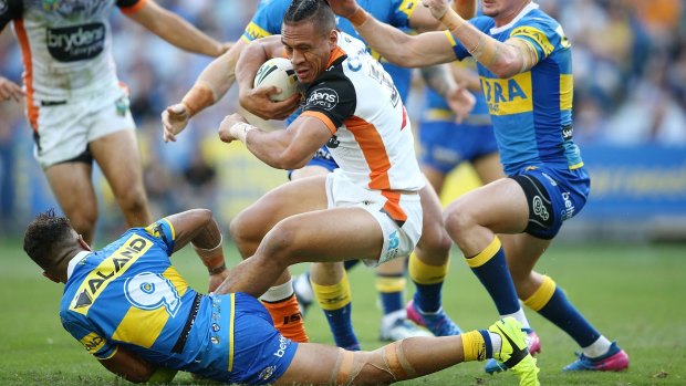 Stopped in his tracks: The Eels bring down Sauaso Sue.