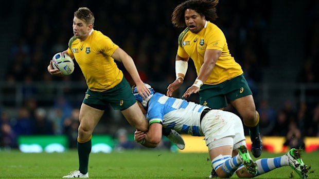 Breakaway: Drew Mitchell's late run sealed the game for Australia.