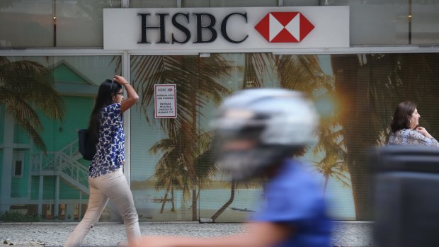 People pass an HSBC branch in Rio de Janeiro last month. Before the probe, HSBC announced a plan to sell its operations in Brazil and Turkey.