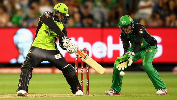  Usman Khawaja of the Thunder plays a shot during the Big Bash League final match between Melbourne Stars and the Sydney Thunder at Melbourne Cricket Ground on Sunday. 