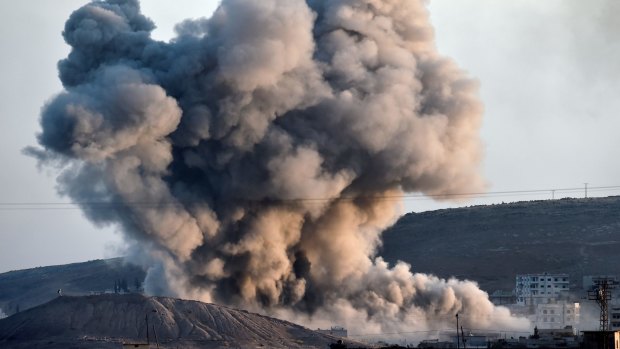 Smoke rises from an air strike on the Syrian town of Kobane, also known as Ayn al-Arab.