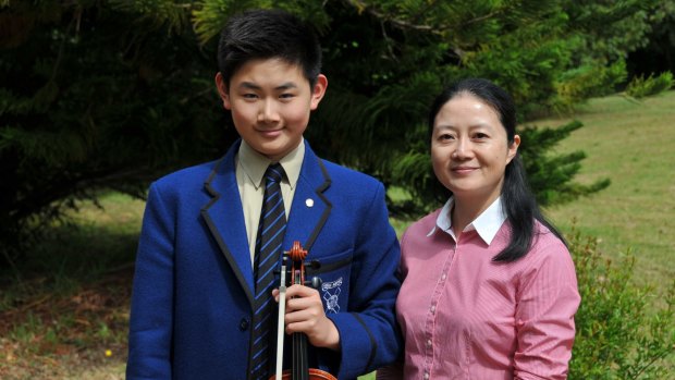 Knox Grammar music scholarship student Kevin Fan with his mother Vivian Rong Xu. 