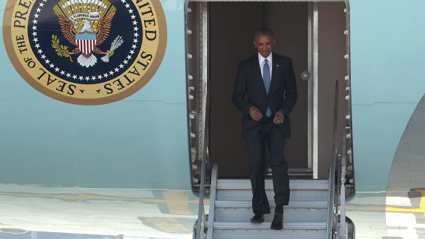 No roll-up staircase available: US president Barack Obama exits Air Force One from its own hatch, at the Hangzhou Xiaoshan International Airport.