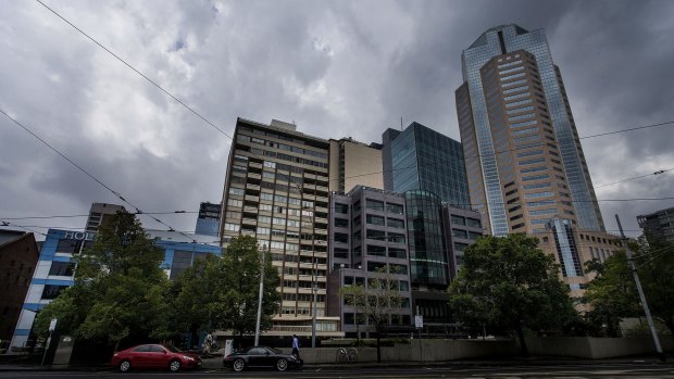 Clouds lowered over the CBD on Thursday, before a huge downpour.