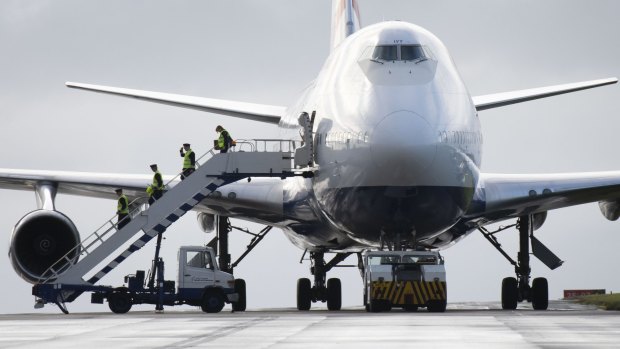 British Airways crew depart a Boeing 747-400 for the last time after it arrives at St. Athan airport in Wales in October.