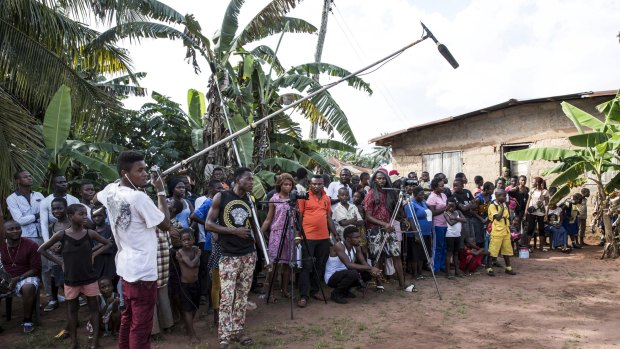 Nearly the entire village comes out to watch filming for a Nollywood movie in Igbuzor, Nigeria.