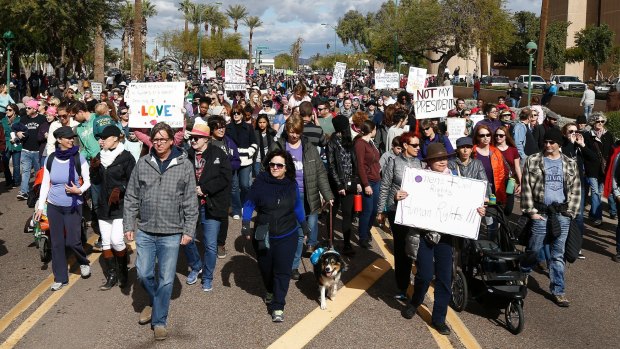 Hundreds of thousands of demonstrators march in support of the Women's March on Washington on Saturday.