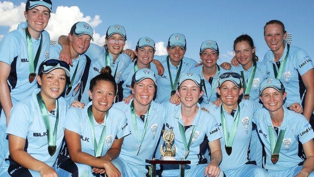 The NSW Breakers pose after winning the WNCL final.