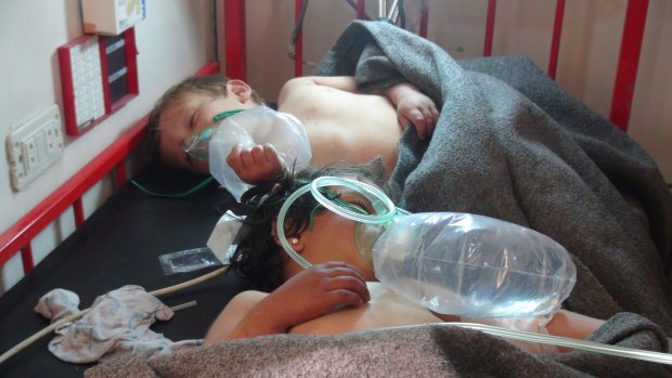 Young victims of the suspected chemical attack are treated in hospital.