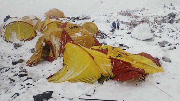 The scene after an avalanche triggered by a massive earthquake swept across Everest Base Camp.