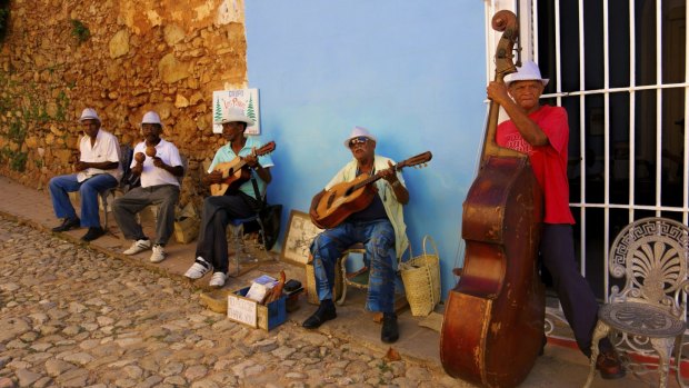 A street band playing salsa in the streets of historic Trinidad.