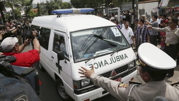 One of ambulances carrying the bodies of Australian death-row prisoners Andrew Chan and Myuran Sukumaran arrives at a funeral home in Jakarta.