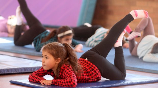 Children doing yoga over the school holidays.