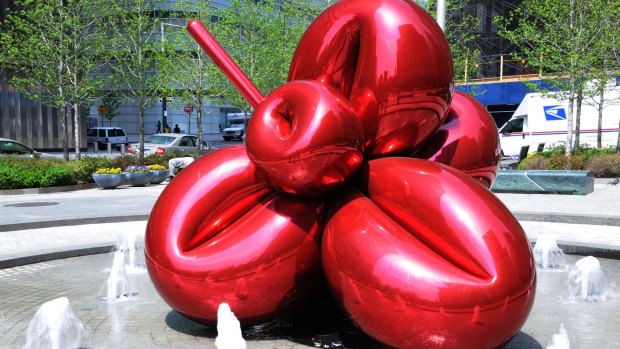 Jeff Koons' Balloon Flower (Red) in the plaza in front of 7 World Trade Center in Lower Manhattan. 