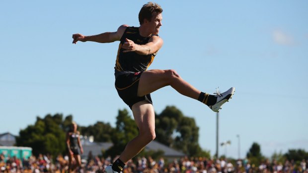Kicking on: Jack Riewoldt boots the ball forward during a NAB Challenge match.