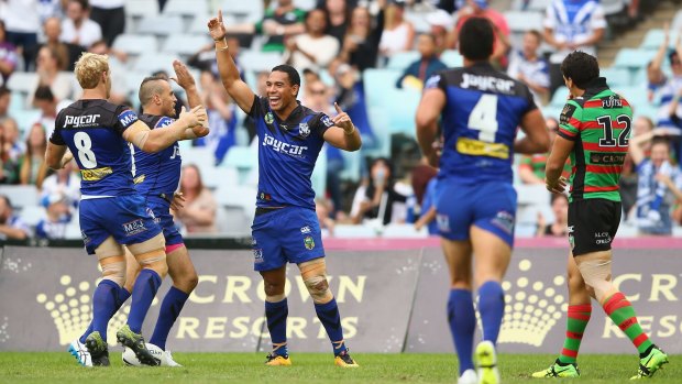 On fire: Will Hopoate celebrates scoring a try during round four.