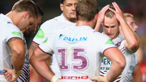 Long season ahead: Daly Cherry-Evans looks dejected after another Eels try on Friday night.