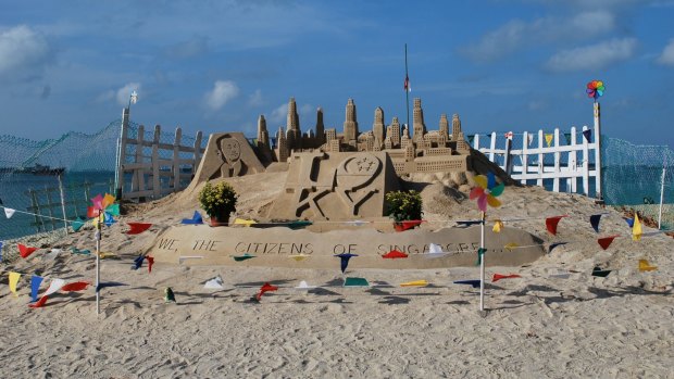 A detailed sand sculpture at Castle Beach in Singapore.