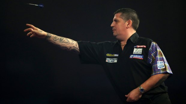 Scotland's Gary Anderson in action against England's James Wade in the quarter-final.