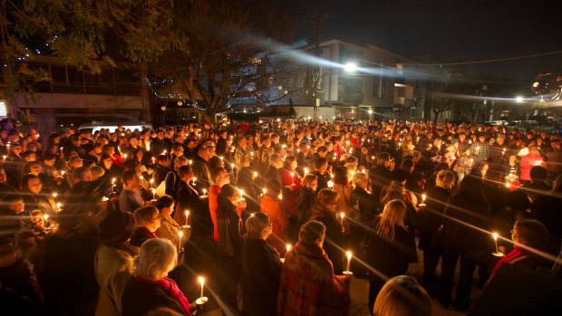 A candlelight vigil is held for Ms Connelly a month after her murder.