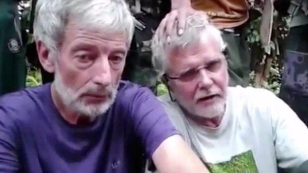 Canadians Robert Hall, left, and John Ridsdel, right, were beheaded by Abu Sayyaf in June. 